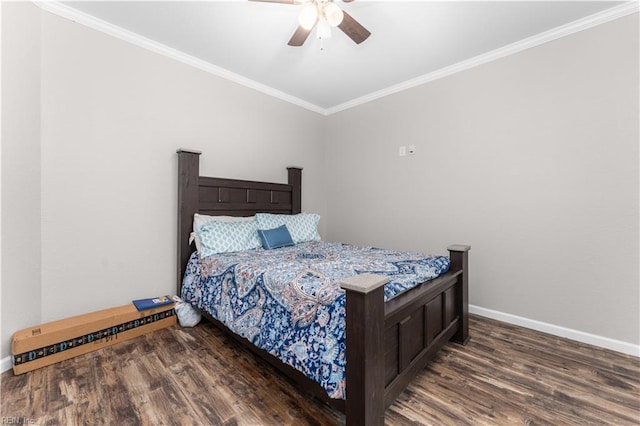 bedroom featuring crown molding, ceiling fan, and dark hardwood / wood-style floors