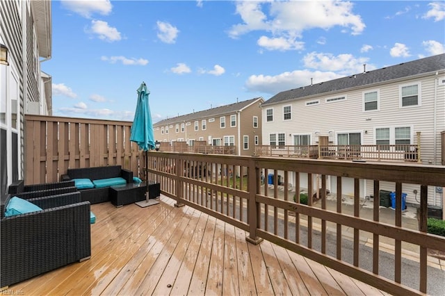 wooden deck with an outdoor hangout area