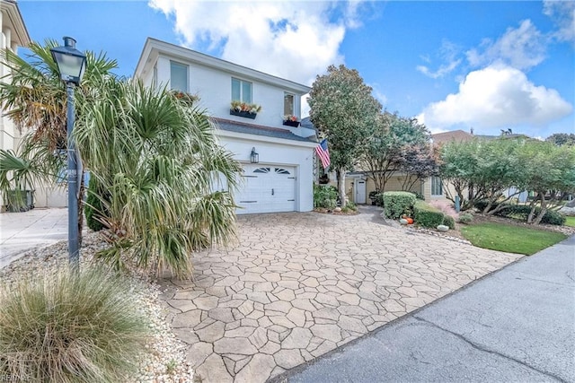 view of front of home with a garage