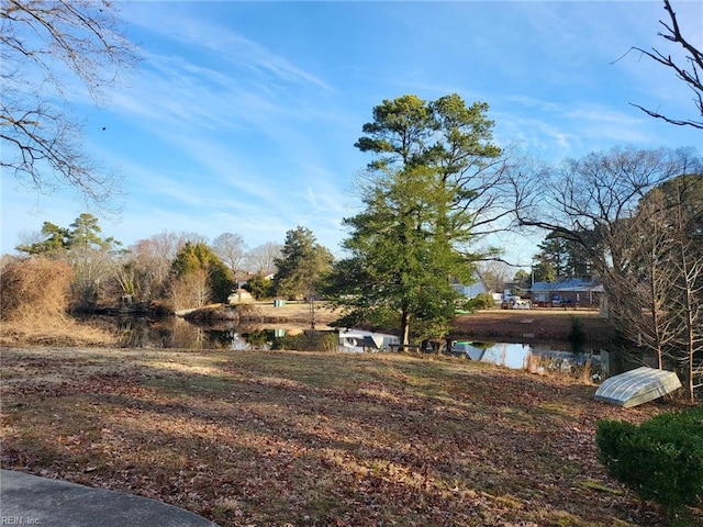 view of yard with a water view