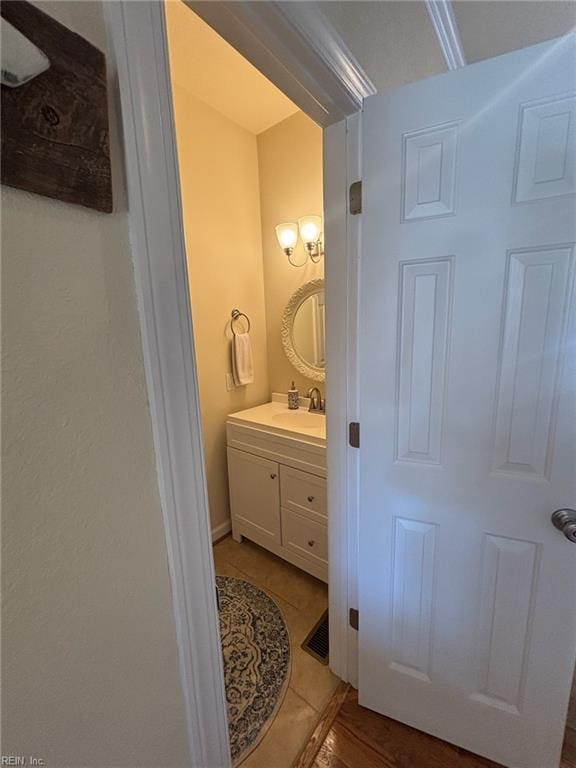 bathroom featuring tile patterned floors and vanity