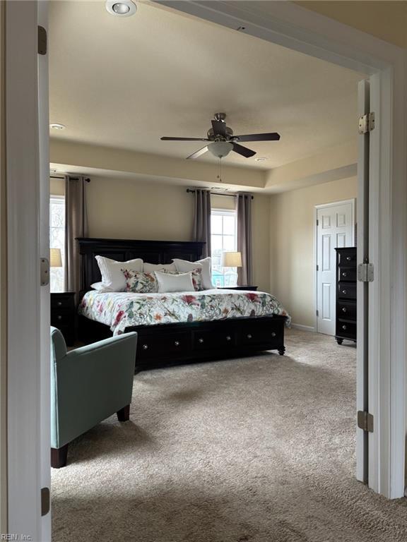 bedroom featuring carpet floors and ceiling fan