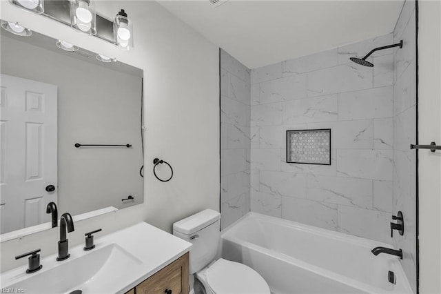 full bathroom with tiled shower / bath combo, vanity, and toilet