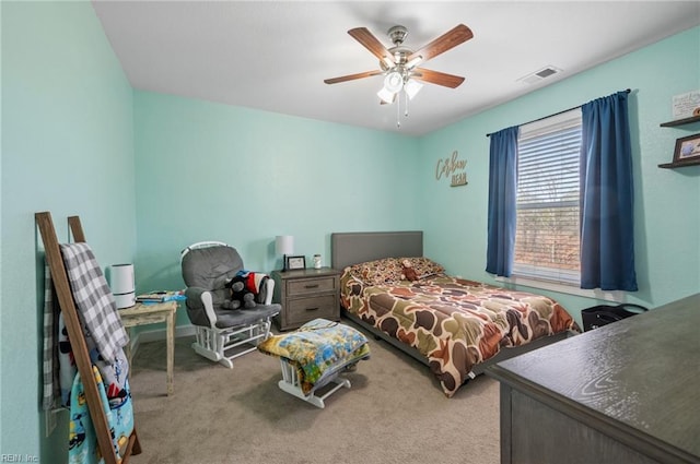 carpeted bedroom with ceiling fan