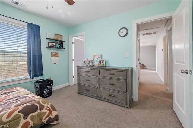 carpeted bedroom with ceiling fan