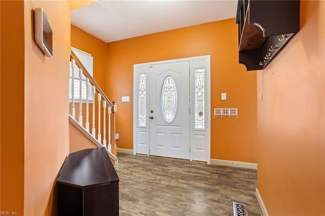 entryway with wood-type flooring