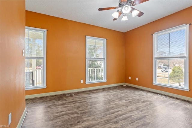 unfurnished room featuring hardwood / wood-style floors and ceiling fan