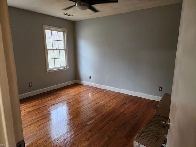 unfurnished room featuring ceiling fan and light hardwood / wood-style floors