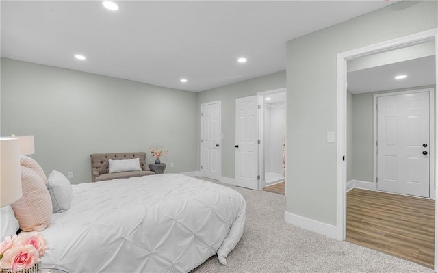 bedroom with light colored carpet