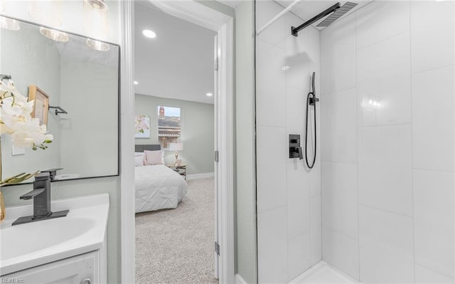 bathroom featuring tiled shower, ensuite bath, vanity, and recessed lighting