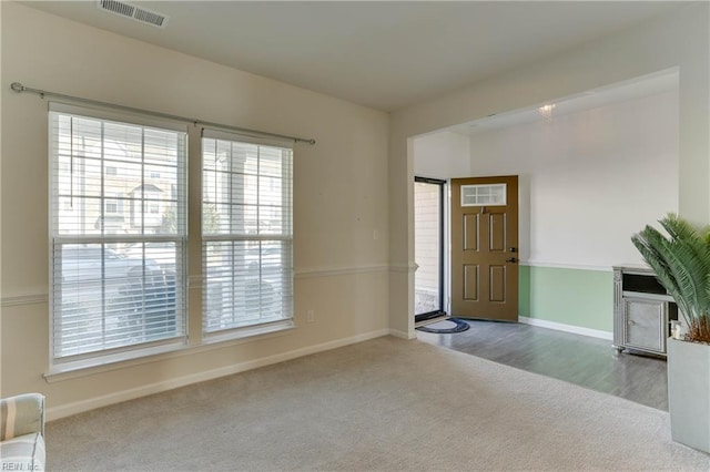 entryway with carpet