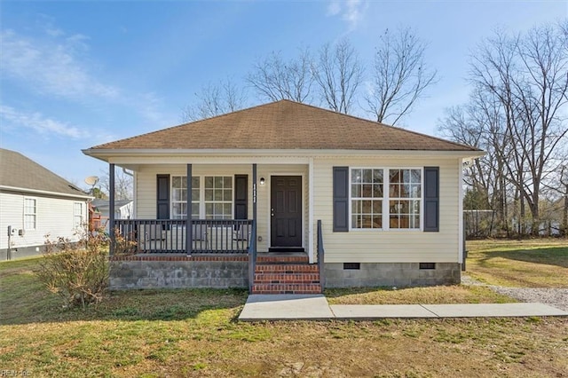 bungalow with a porch and a front lawn