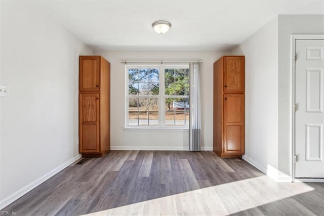 spare room with light hardwood / wood-style flooring