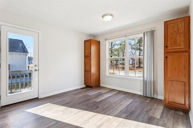 doorway to outside featuring hardwood / wood-style flooring