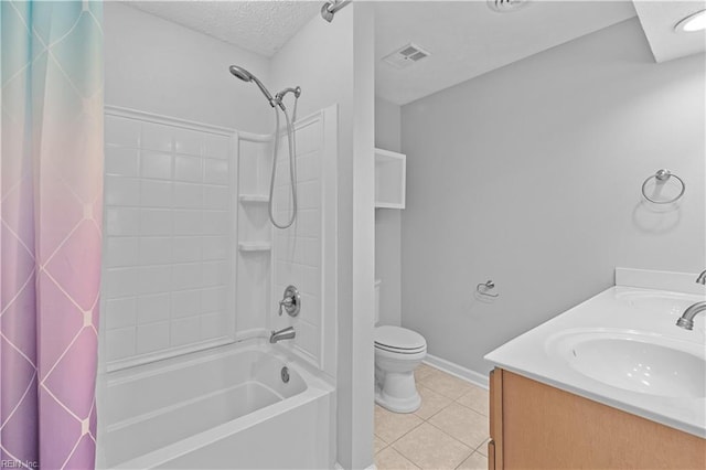 full bathroom with shower / bath combo, tile patterned flooring, vanity, a textured ceiling, and toilet