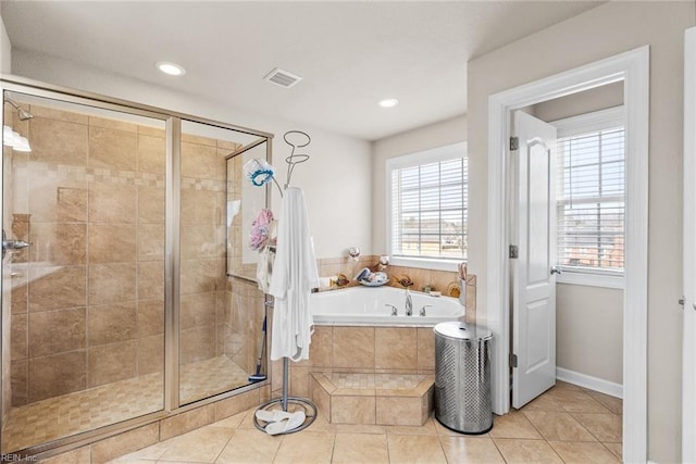 bathroom featuring tile patterned floors and plus walk in shower