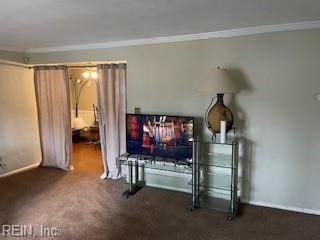 living room featuring ornamental molding and dark colored carpet