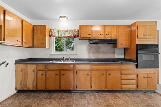 kitchen featuring sink and black appliances