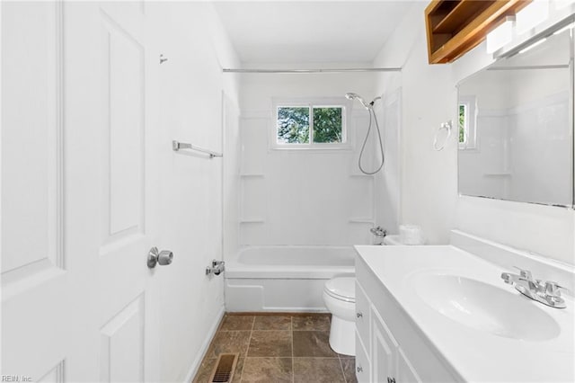 full bathroom with vanity, bathtub / shower combination, and toilet