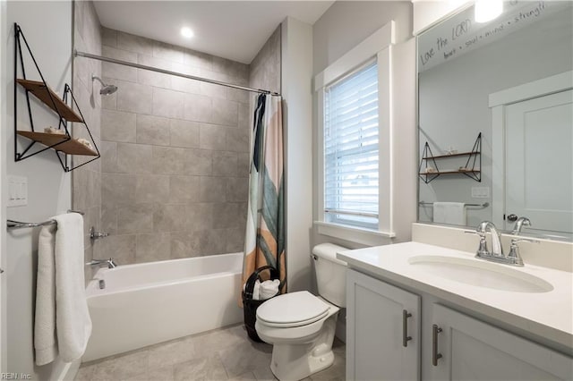 full bathroom featuring vanity, toilet, and shower / bath combo with shower curtain