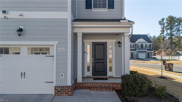 entrance to property with a garage