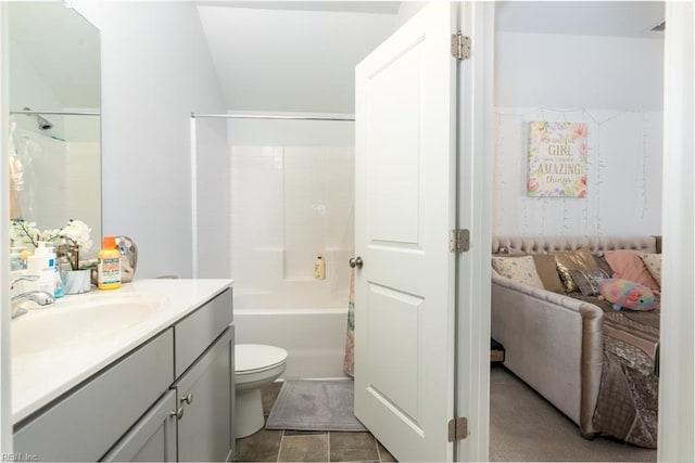 full bathroom with vanity, toilet, and washtub / shower combination