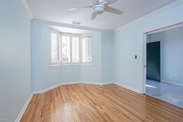 unfurnished room with light hardwood / wood-style flooring, ornamental molding, and ceiling fan