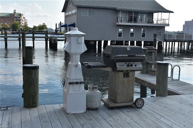 dock area featuring a water view