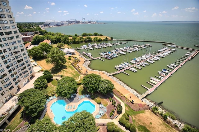 birds eye view of property featuring a water view