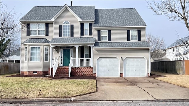 front facade featuring a garage and a front yard