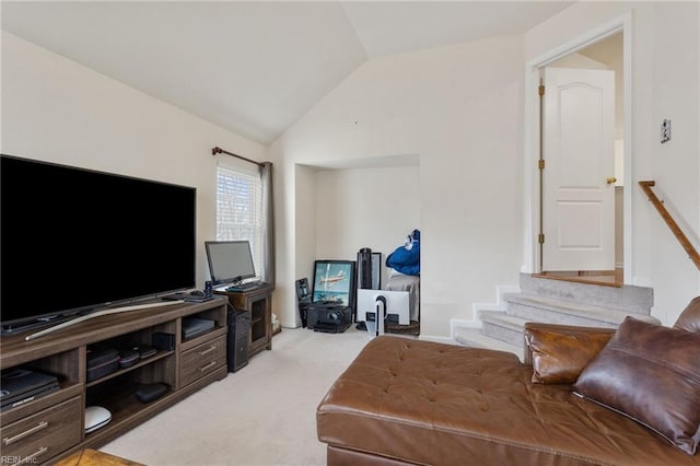 living room featuring lofted ceiling and light carpet