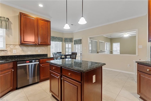 kitchen with hanging light fixtures, stainless steel dishwasher, ornamental molding, dark stone counters, and backsplash