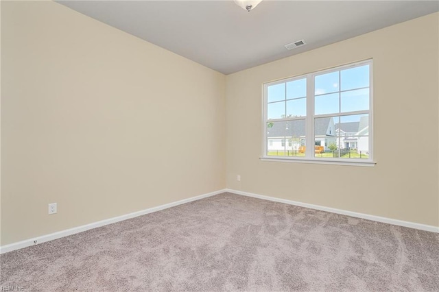 view of carpeted spare room