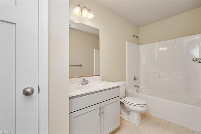 full bathroom featuring tile patterned flooring, vanity, bathtub / shower combination, and toilet