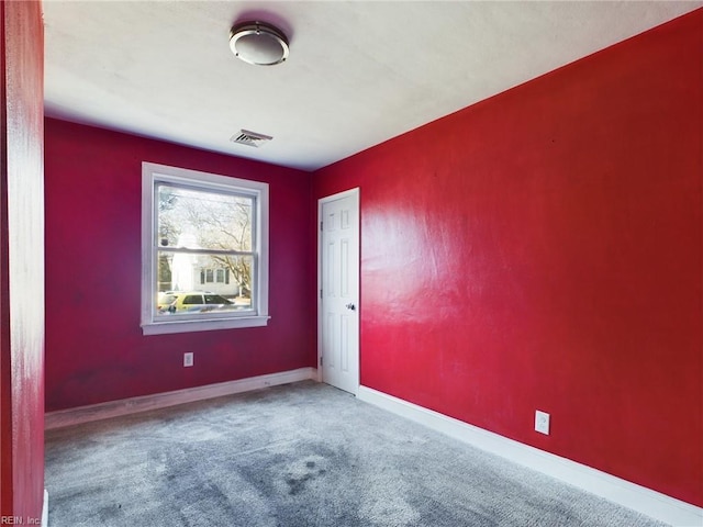 empty room featuring carpet