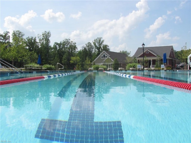 pool featuring fence