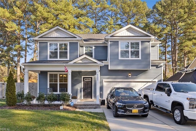 view of front of house with a garage and a front yard