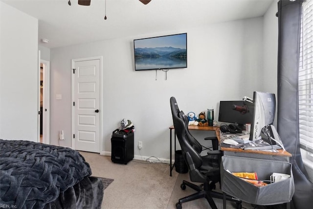 carpeted bedroom featuring ceiling fan