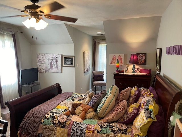 bedroom with vaulted ceiling and ceiling fan