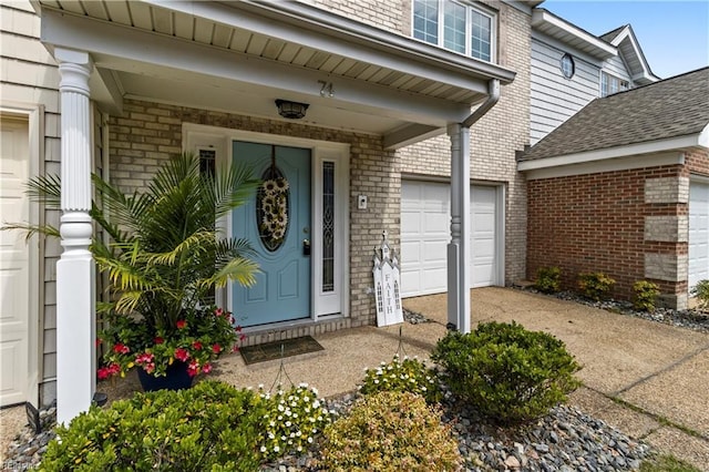 entrance to property featuring a garage