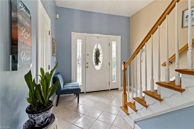 entrance foyer featuring light tile patterned floors