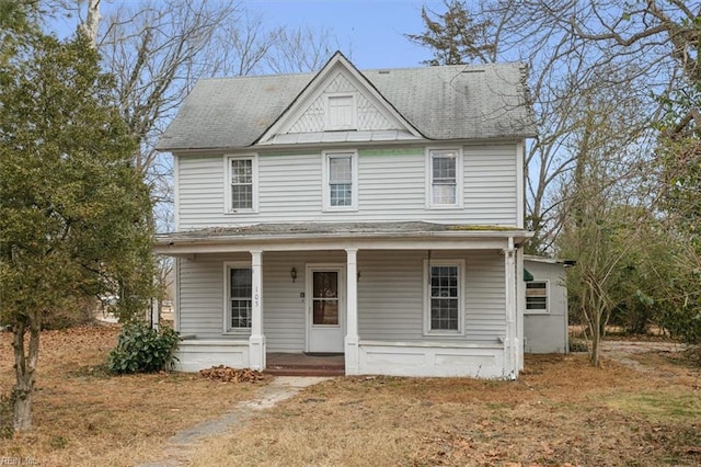 view of front of property featuring covered porch