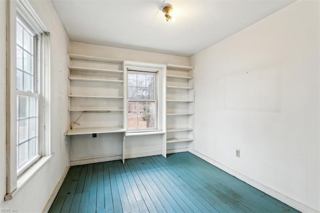 unfurnished room featuring hardwood / wood-style flooring