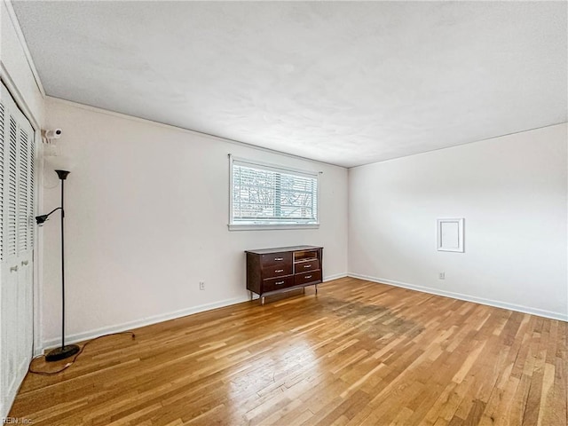 unfurnished bedroom with light hardwood / wood-style flooring