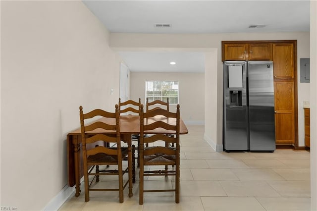 dining space featuring electric panel