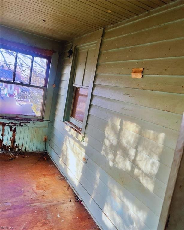 room details featuring wooden walls