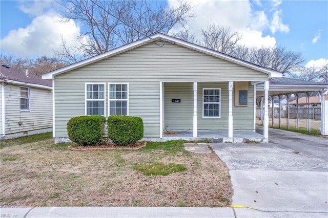 bungalow-style house with a carport and a porch