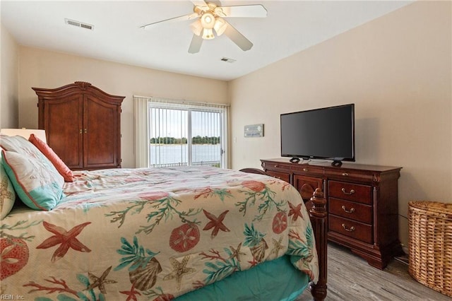 bedroom featuring ceiling fan, access to outside, and light hardwood / wood-style floors