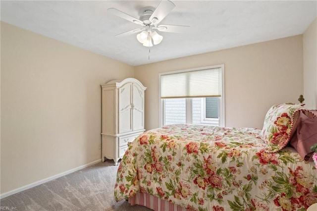 bedroom with light carpet and ceiling fan