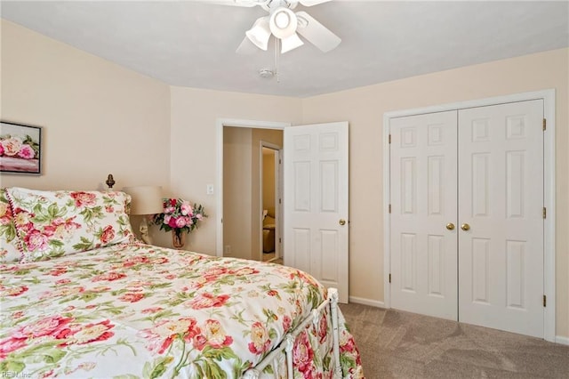 bedroom with carpet, ceiling fan, and a closet